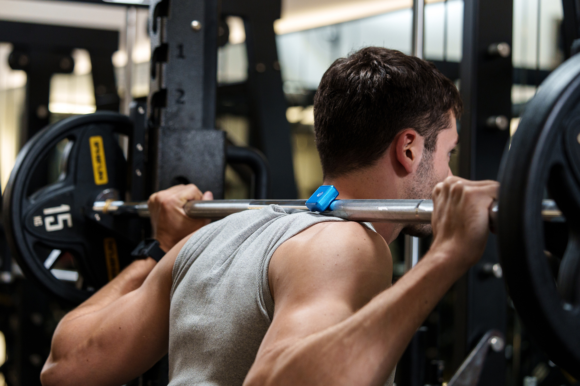 PoinT GO sensor on barbell during back squat